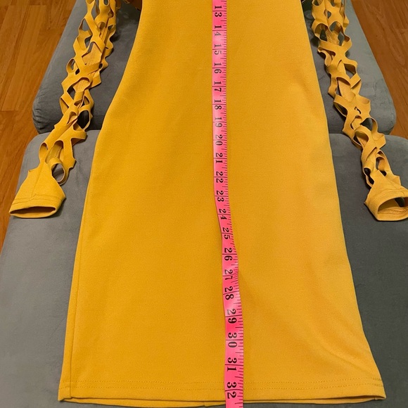 Brand: Another Story
Product: Fitted Mini Dress w/Diamond Peek-A-Boo Sleeves - Picture 8 of 11